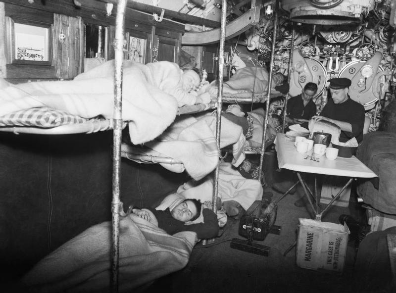 O14 - crew at rest 
While submerged, officers and men rest in order to save oxygen on board the Dutch submarine O 14. Off duty they must exert themselves as little as possible. The crew rest on board the Dutch submarine O-14, January 1942.  O14 - crew at rest